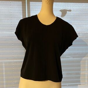 Yoga brand Black v-neck tee.